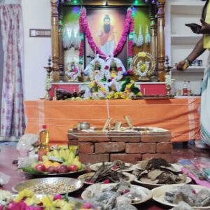 Sacred Sukshma Nadi homam altar decorated with offerings and Agasthiyar portrait in Madurai.